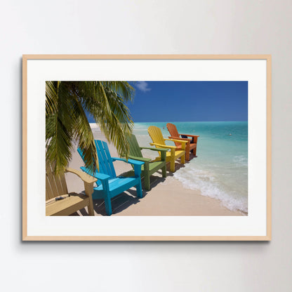 Colorful beach chairs on caribbean coast