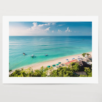 Tropical blue ocean, sandy beach and boats in Indonesia, Bali