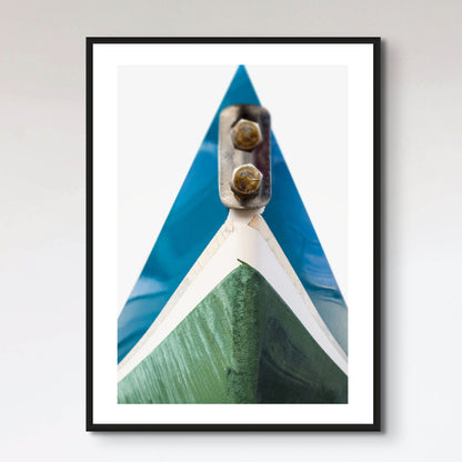 Blue and green hull of sail boat