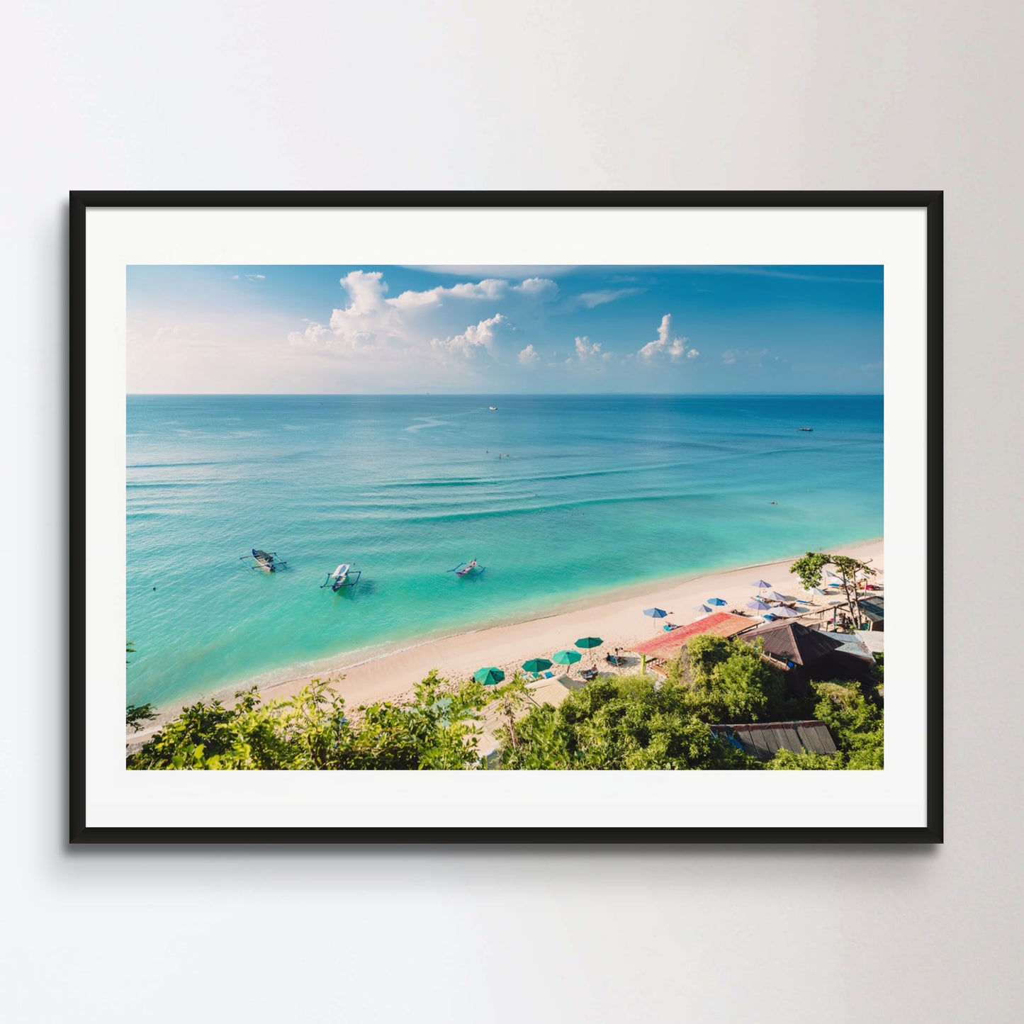 Tropical blue ocean, sandy beach and boats in Indonesia, Bali