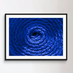 Heavy-duty bright blue coiled ships rope
