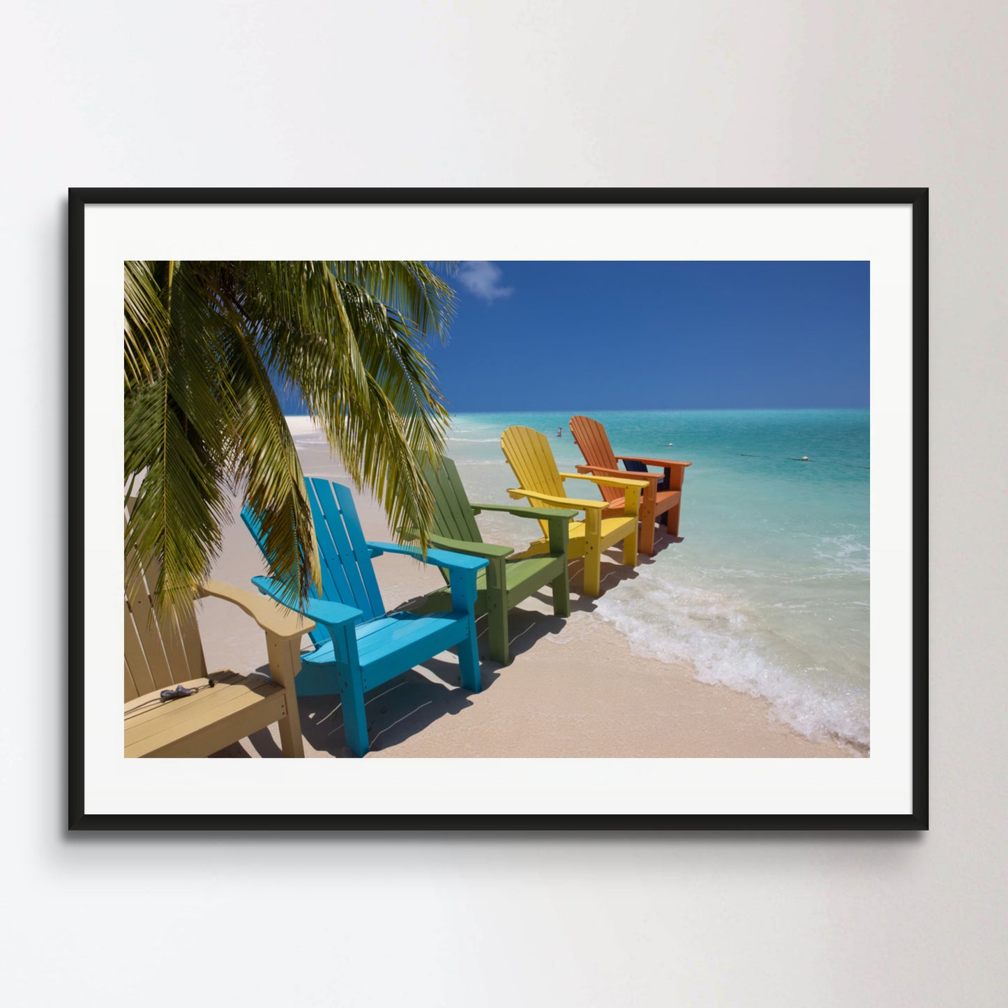 Colorful beach chairs on caribbean coast