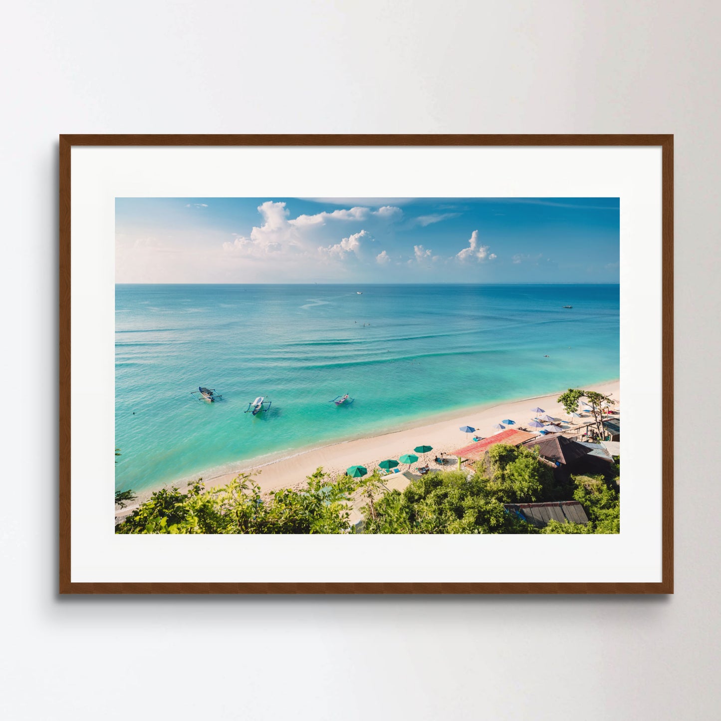 Tropical blue ocean, sandy beach and boats in Indonesia, Bali