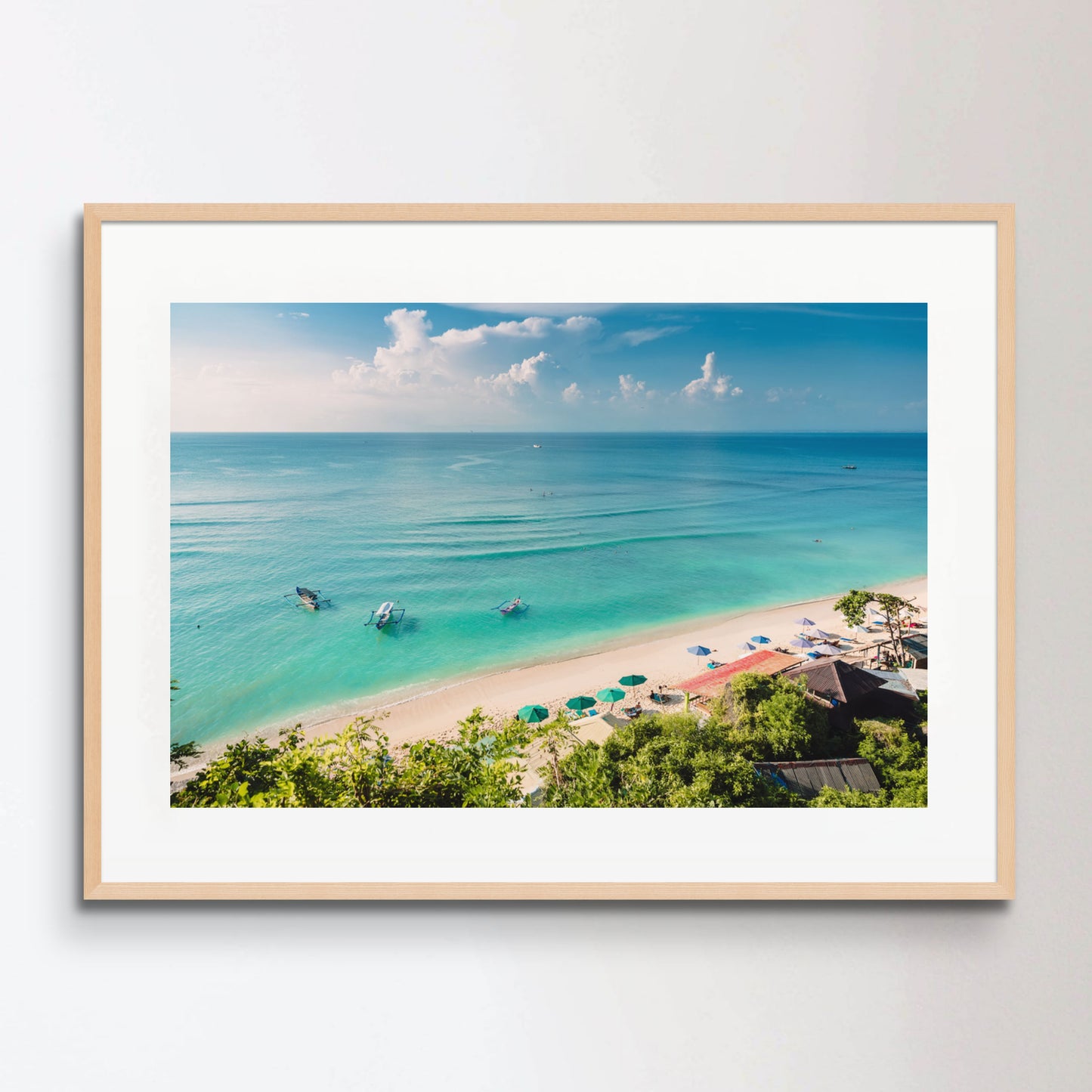 Tropical blue ocean, sandy beach and boats in Indonesia, Bali