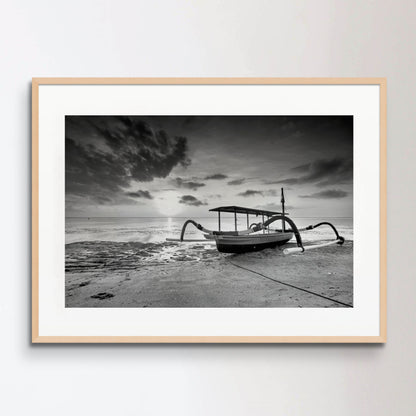 Boat Moored On Beach Against Sky During Sunset