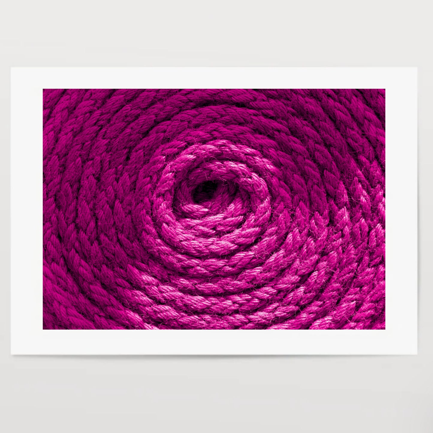 Heavy-duty magenta pink coiled ships rope