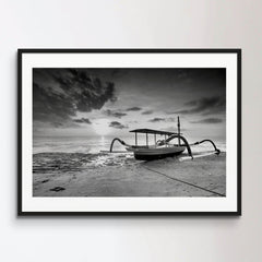 Boat Moored On Beach Against Sky During Sunset