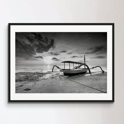 Boat Moored On Beach Against Sky During Sunset