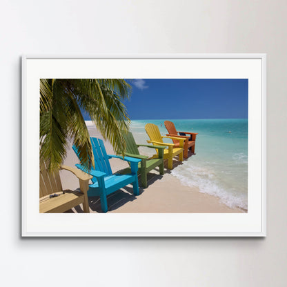 Colorful beach chairs on caribbean coast