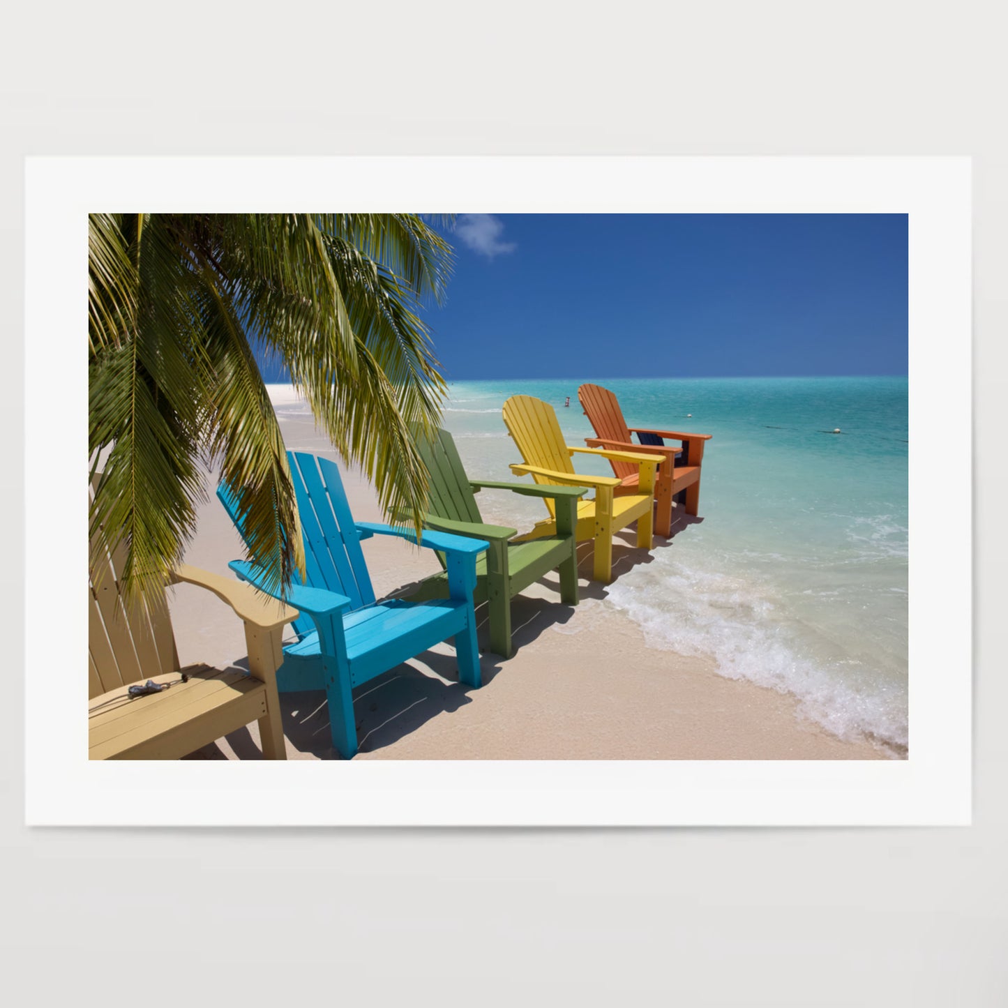 Colorful beach chairs on caribbean coast